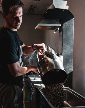 Dumping coffee out of our fluid bed air roaster. Medium Roasted coffee being dumped from the roaster into the bean cooler